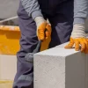 bricklayer working building wall aerated